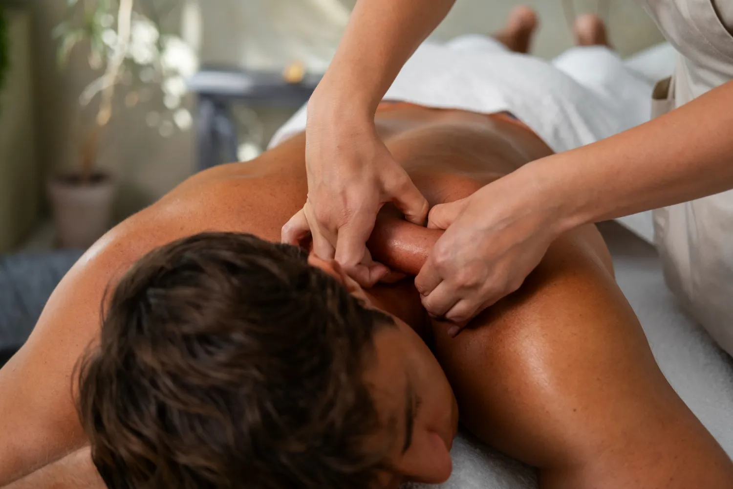 Professional massage therapy session for relaxation and pain relief